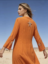Mid-length dress embroidered with starfish, Liberty print