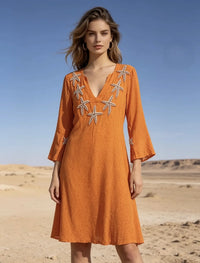 Mid-length dress embroidered with starfish, Liberty print